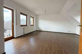Helle Dachgeschosswohnung im alten Ortskern von Niederdorfelden in Niederdorfelden