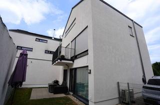 Ihr neues Zuhause in Seligenstadt: Moderne Gartenwohnung mit Terrasse und offener K&uuml;che in Seligenstadt