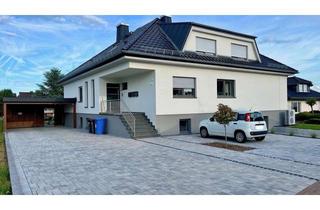 Gro&szlig;z&uuml;gige 5-Zimmer-Erdgeschosswohnung mit Traumterrasse in einem kernsanierten Dreifamilienhaus in Beselich
