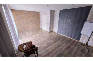 Gepflegte 3-Zimmer-Wohnung mit Balkon, Garage und Klimaanlage in zentraler Lage in Halle (Westfalen)
