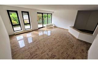 Gro&szlig;z&uuml;gige 3-Zimmer-Erdgeschosswohnung mit S&uuml;dterrasse und Garage in Halle (Westfalen)