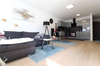 Neuwertige Erdgeschosswohnung mit kleinem Garten in Ergoldsbach